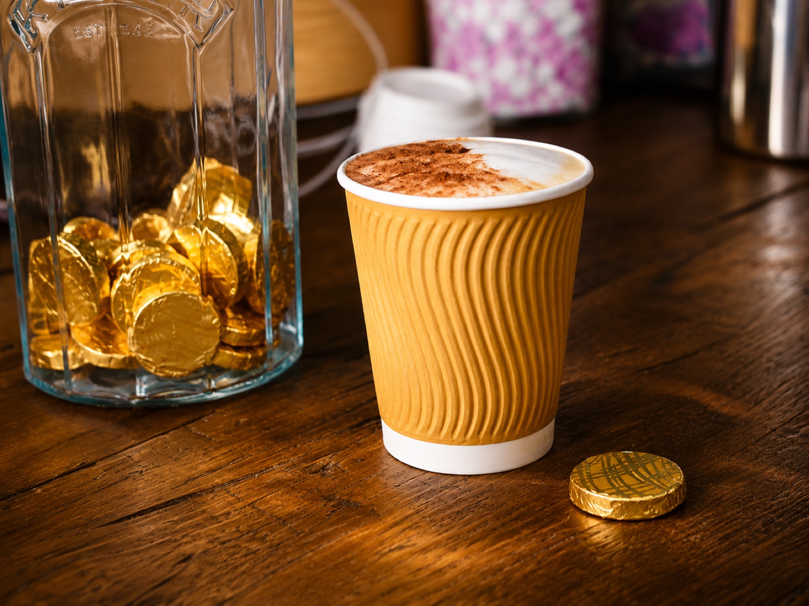 Fresh coffee cup on a wooden counter